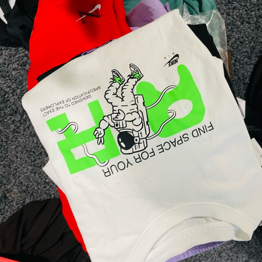 Nike White Tee with Neon Green Astronaut Graphic